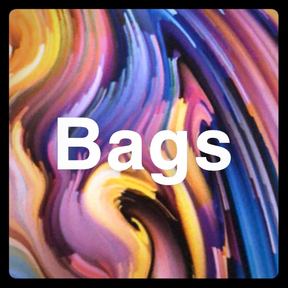 Handbags, wallets, wristlets and totes below...